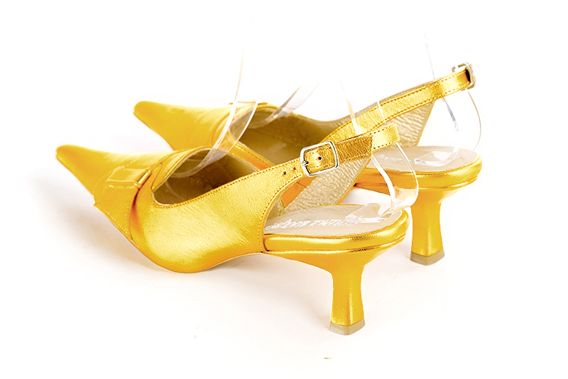 Yellow women's slingback shoes. Pointed toe. Medium spool heels. Rear view - Florence KOOIJMAN